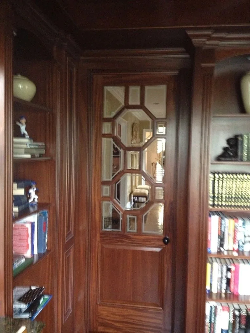 mahogany door with geometric glass and bookcases, Built-Ins & Furniture